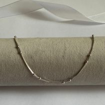 پابند زنانه مدل توپی نقره ای استیل